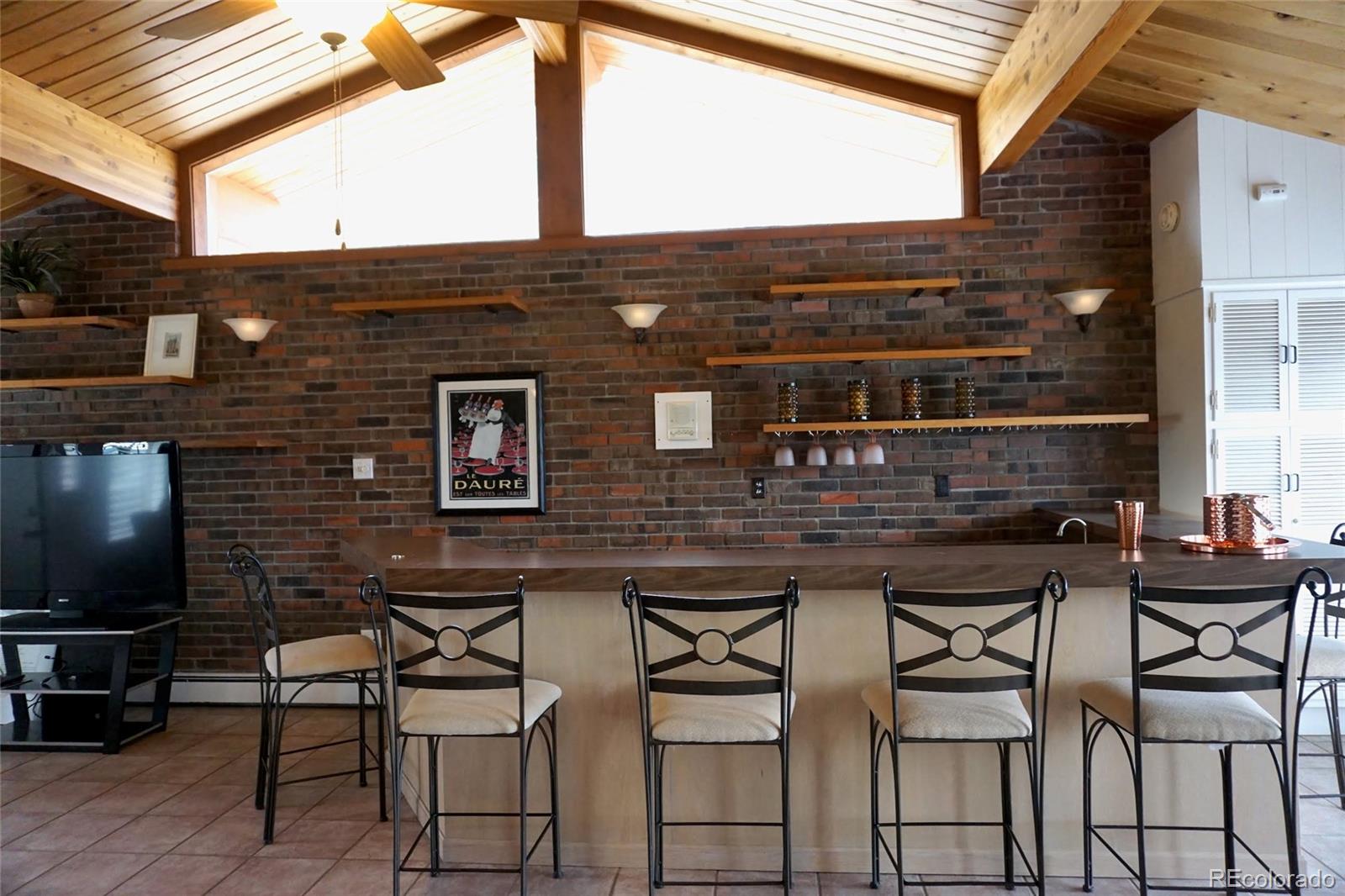 919 Park Street Trinidad, CO 81082 - Photo 15 of 47 a view of backyard with table and chairs and wooden floor