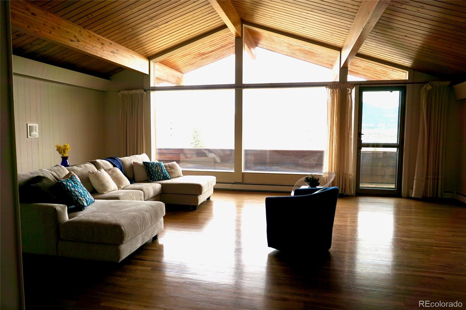 919 Park Street Trinidad, CO 81082 - Photo 21 of 47 a living room with furniture and floor to ceiling window