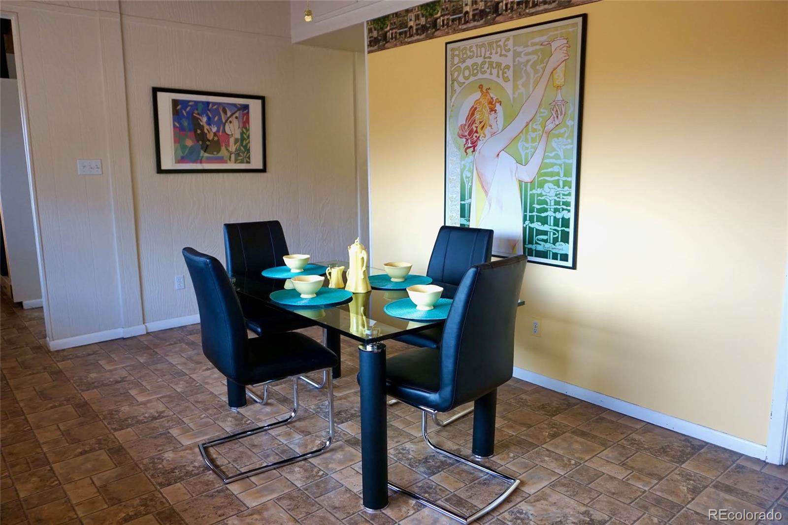 919 Park Street Trinidad, CO 81082 - Photo 23 of 47 a view of a dining room with furniture window and wooden floor
