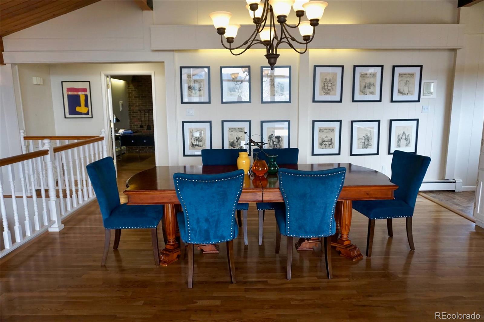 919 Park Street Trinidad, CO 81082 - Photo 25 of 47 a view of a dining room with furniture a chandelier and wooden floor