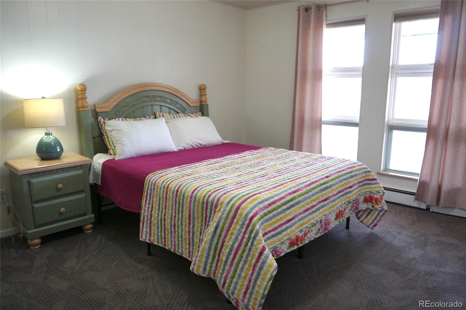 919 Park Street Trinidad, CO 81082 - Photo 35 of 47 a bedroom with a bed and a window