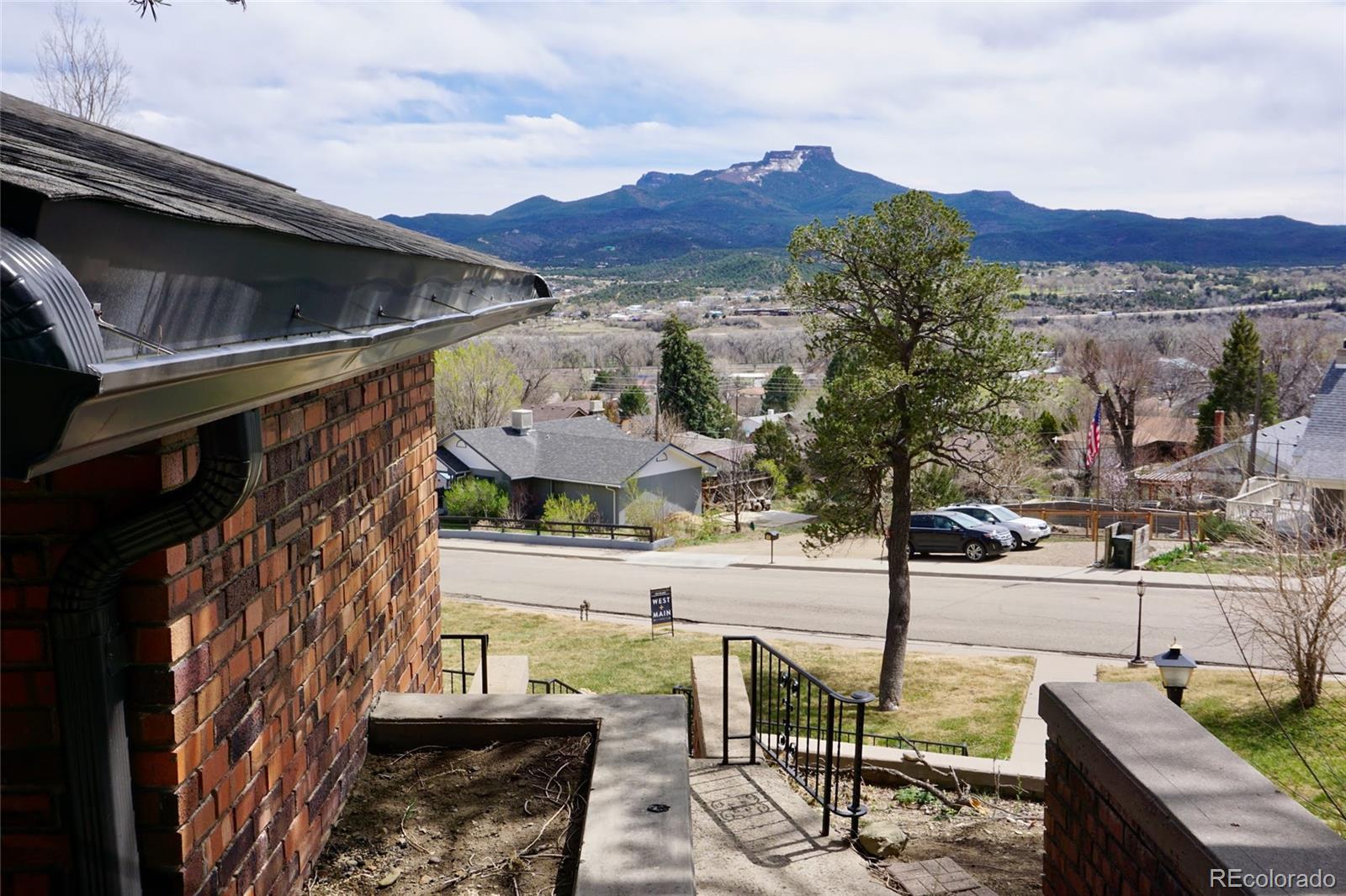 919 Park Street Trinidad, CO 81082 - Photo 4 of 47 a view of a patio with a table and chairs
