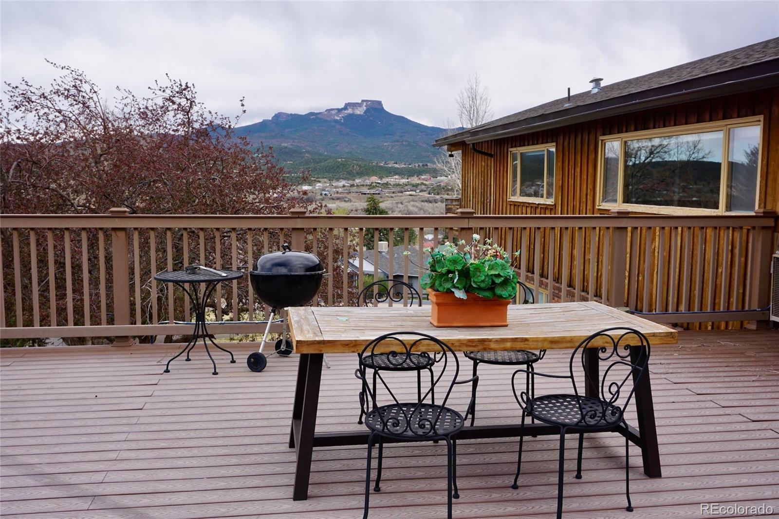 919 Park Street Trinidad, CO 81082 - Photo 42 of 47 a view of a chairs and table on the deck