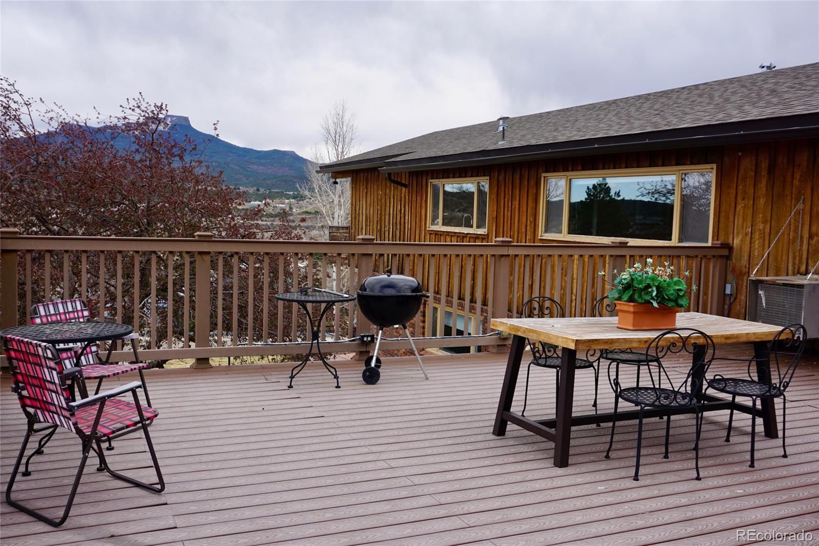 919 Park Street Trinidad, CO 81082 - Photo 43 of 47 a backyard of a house with table and chairs