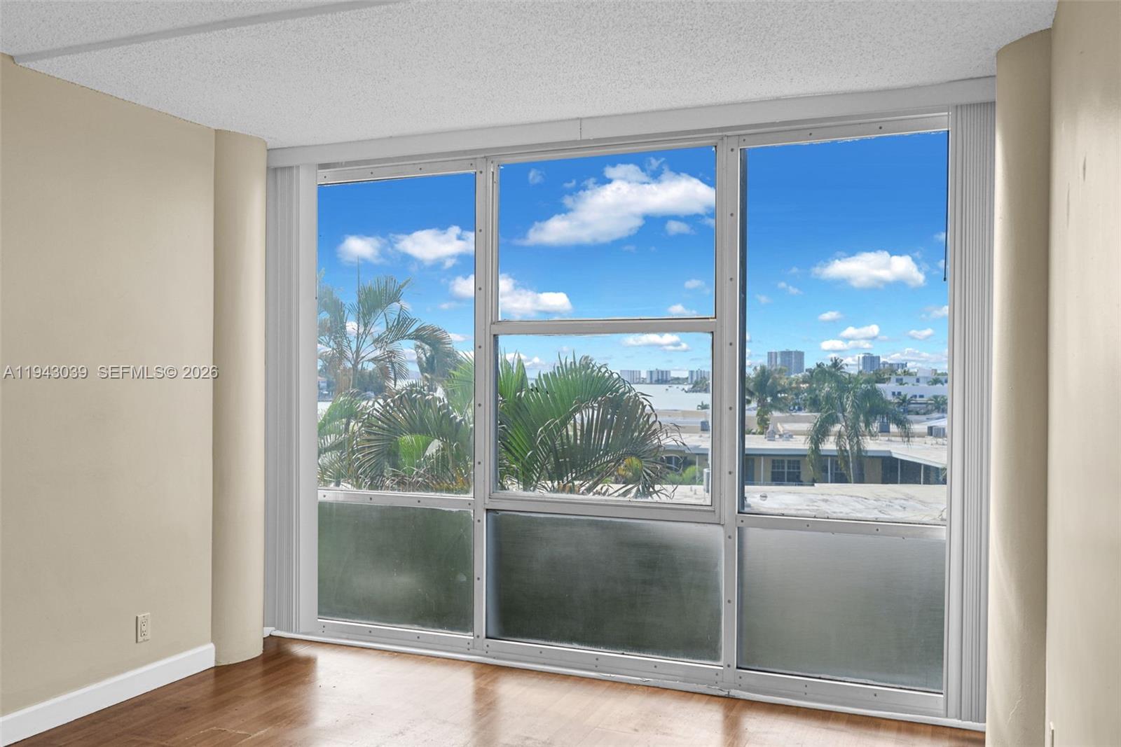 900 Bay Drive, Unit 321 Miami Beach, FL 33141 - Photo 21 of 67 a view of a glass door and a living room