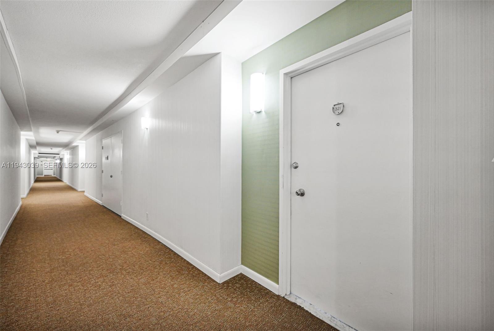 900 Bay Drive, Unit 321 Miami Beach, FL 33141 - Photo 32 of 67 a view of hallway with a hallway