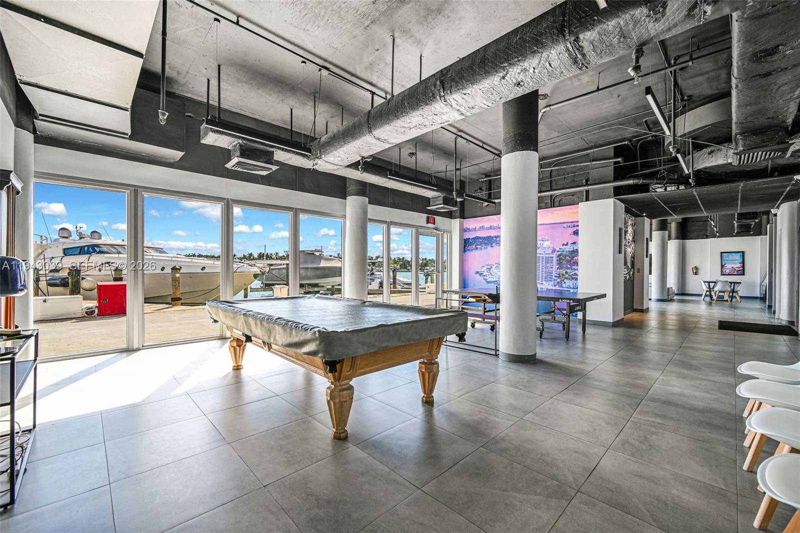 900 Bay Drive, Unit 321 Miami Beach, FL 33141 - Photo 43 of 67 a view of a studio with couch