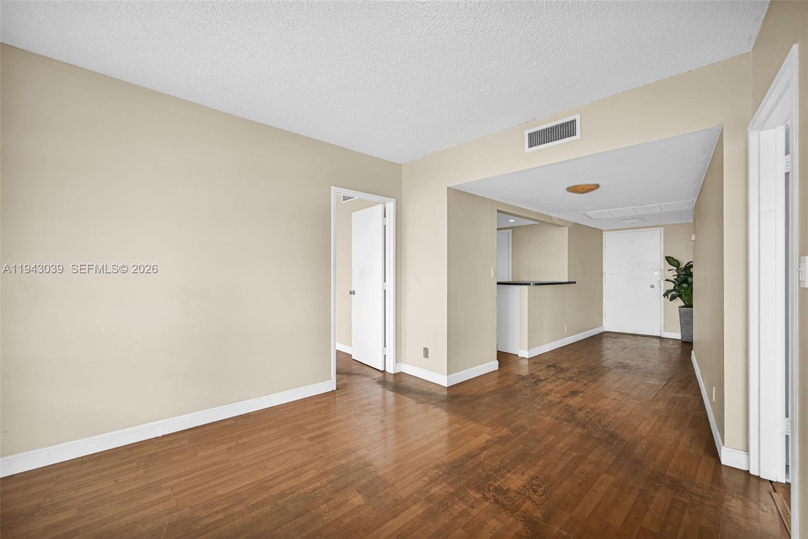 900 Bay Drive, Unit 321 Miami Beach, FL 33141 - Photo 6 of 67 a view of empty room with wooden floor