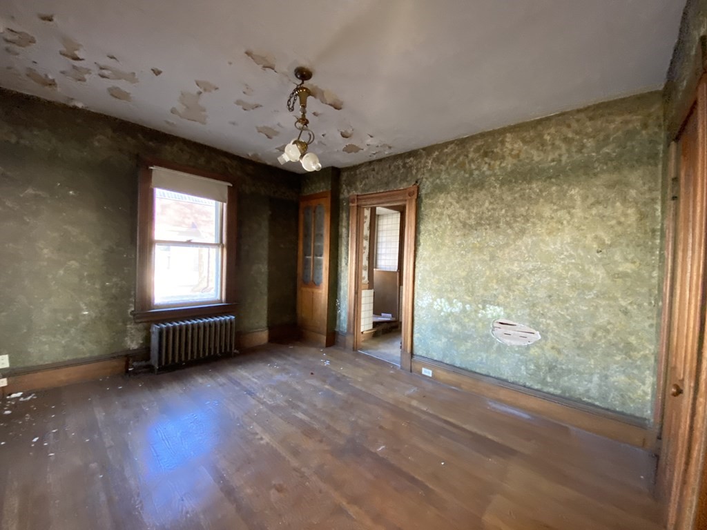 231 Orange Street Springfield, MA 01108 - Photo 13 of 22 a view of livingroom with hardwood