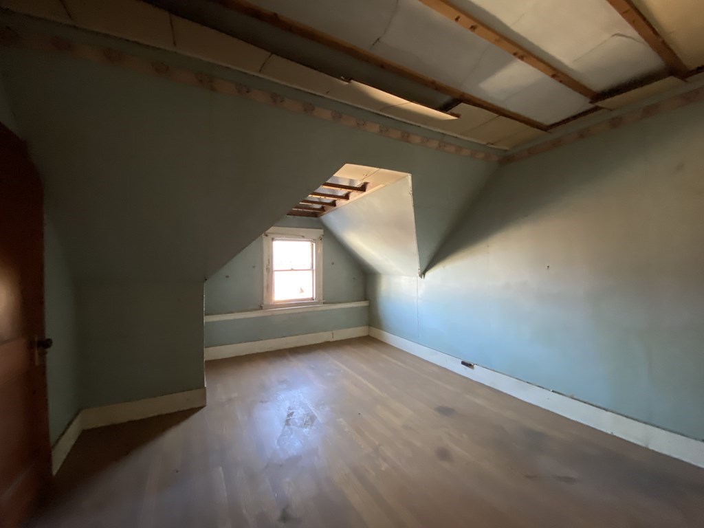 231 Orange Street Springfield, MA 01108 - Photo 19 of 22 wooden floor in an empty room