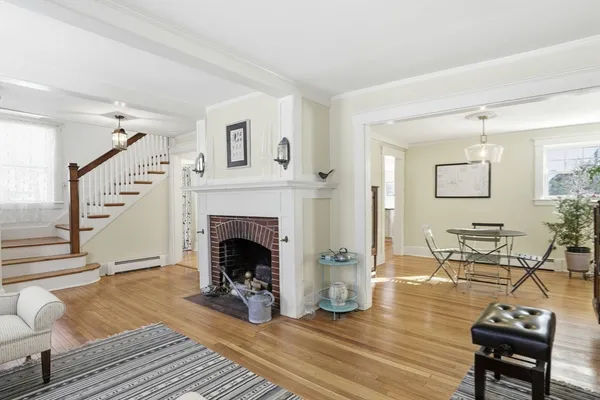 a living room with furniture and a rug