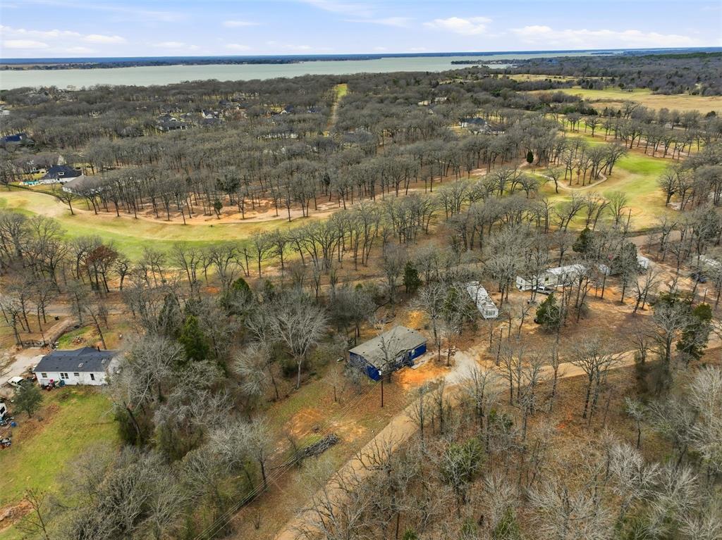 2114 Hickory Street Mabank, TX 75156 - Photo 27 of 31 View of home with golf course and Cedar Creek Lake