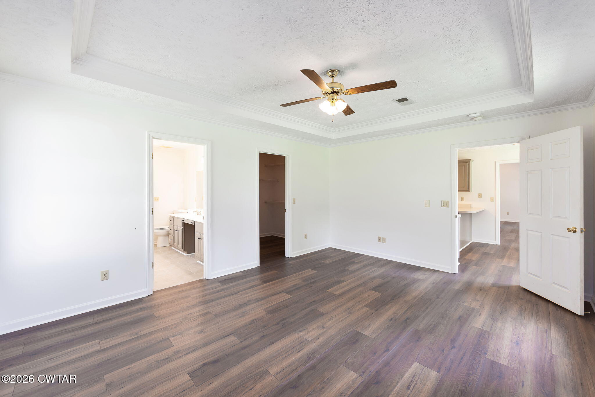 96 Sundown Drive Jackson, TN 38305 - Photo 15 of 28 a view of an empty room and wooden floor