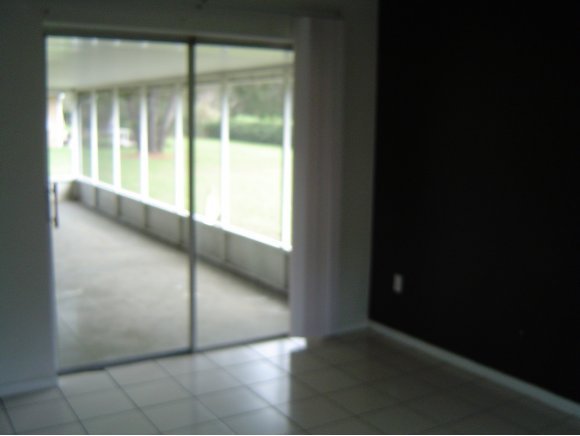 759 Northeast Apollo Palm Bay, FL 32905 - Photo 5 of 12 a view of an empty room with a window