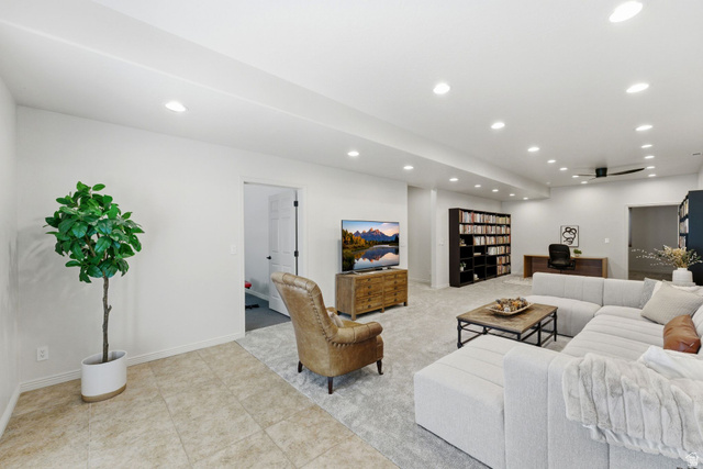 1712 Somerset Ridge Drive Draper, UT 84020 - Photo 59 of 76 Spacious open-plan room featuring recessed lighting, light-colored walls, and a combination of tiled and carpeted flooring