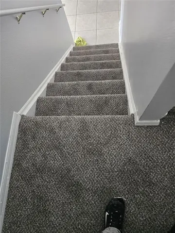 a view of a refrigerator in the kitchen