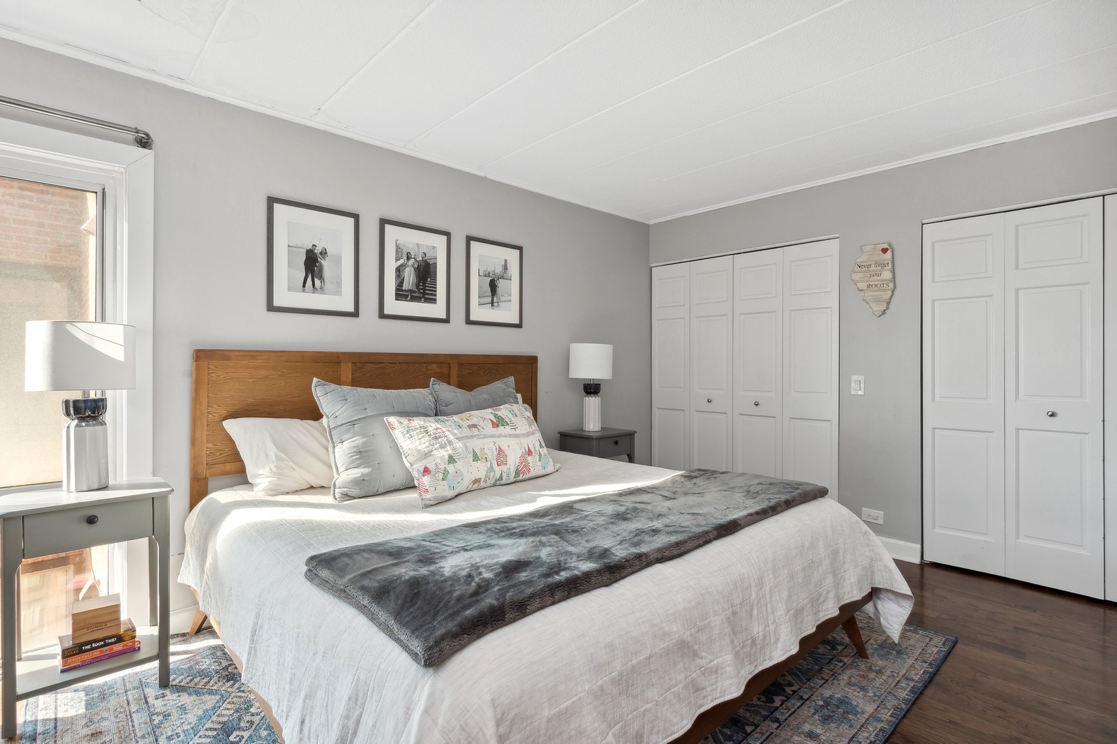 2333 North Geneva Terrace, Unit 6D Chicago, IL 60614 - Photo 8 of 15 a bedroom with a large bed and a painting on the wall