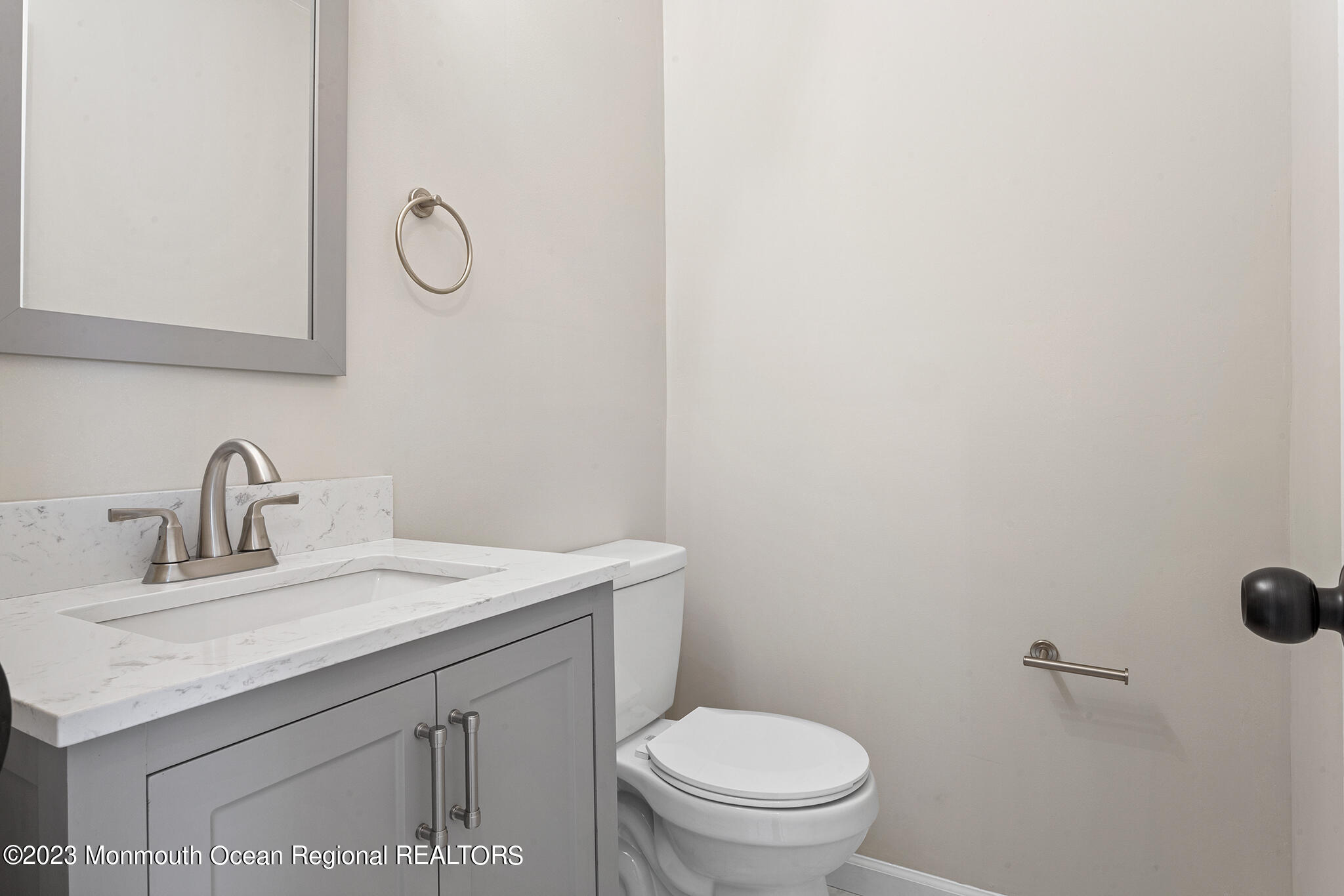 4360 Old Bridge Matawan Road Matawan, NJ 07747 - Photo 24 of 46 a bathroom with a sink a toilet and a mirror
