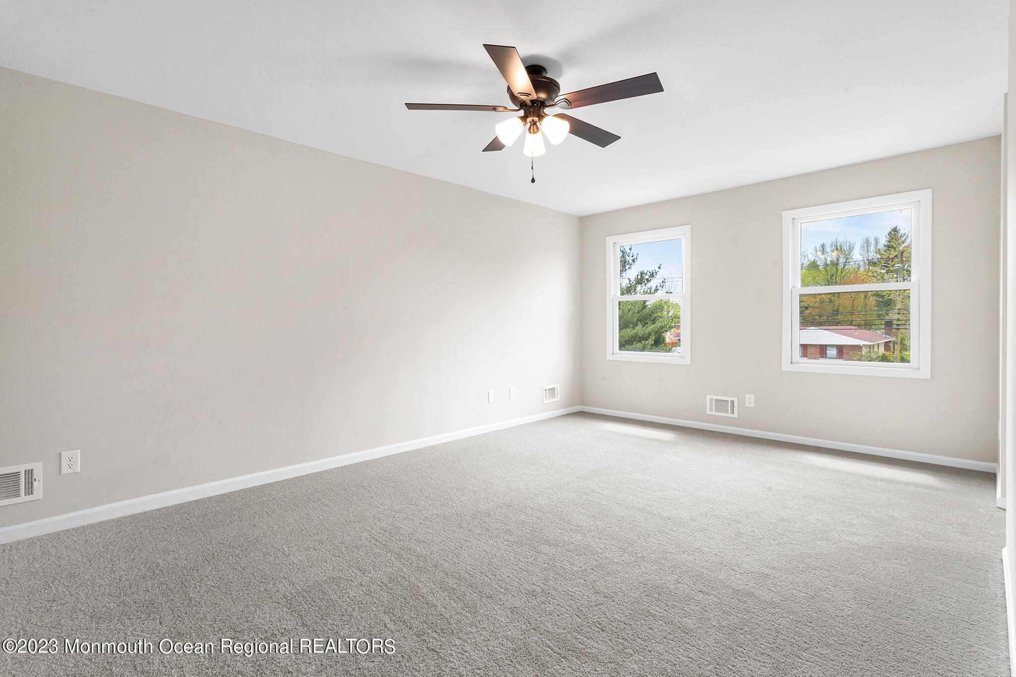 4360 Old Bridge Matawan Road Matawan, NJ 07747 - Photo 28 of 46 an empty room with windows and fan