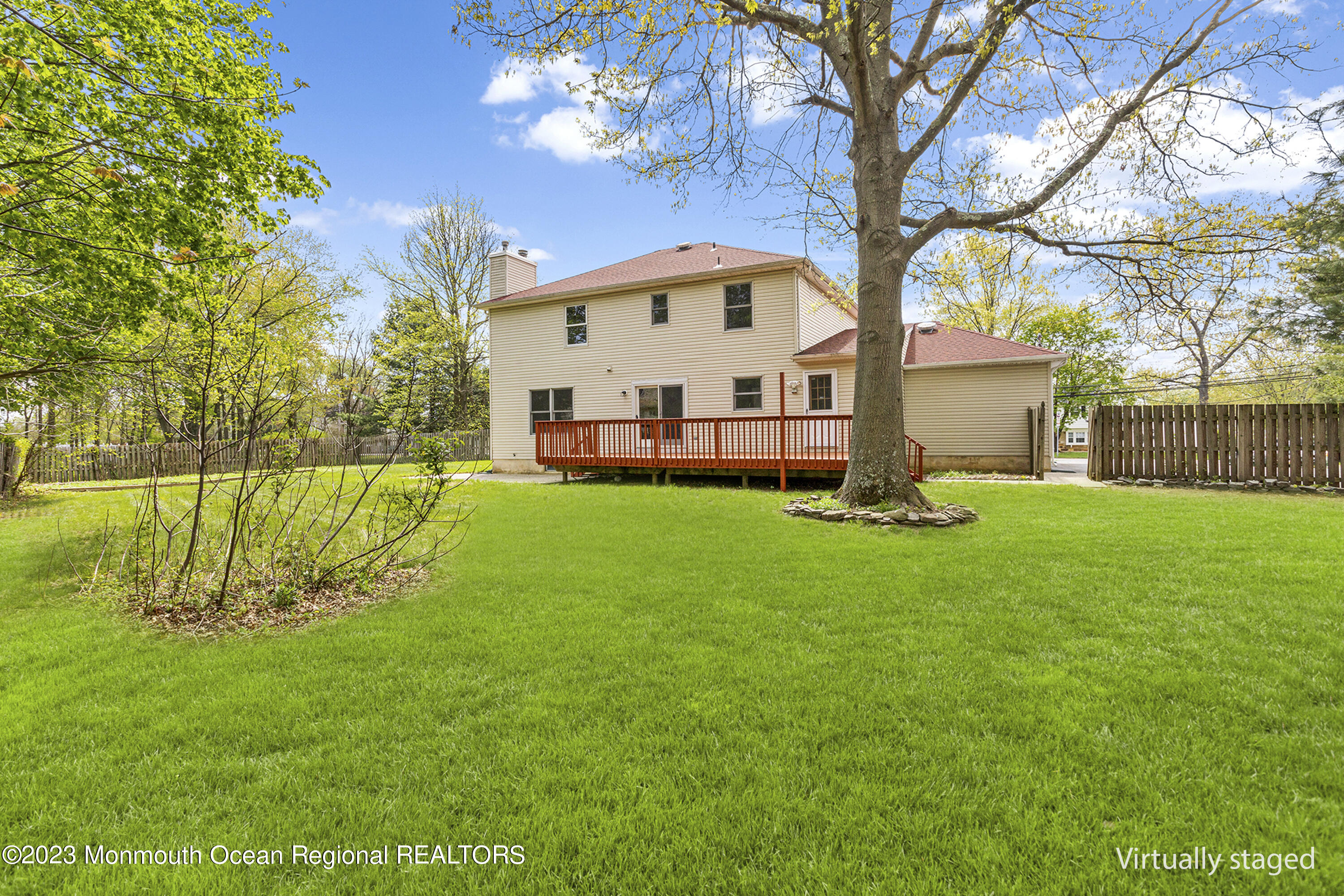 4360 Old Bridge Matawan Road Matawan, NJ 07747 - Photo 45 of 46 a view of a house with a yard and sitting area