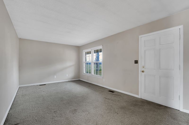151 Robert Branch Drive Tullahoma, TN 37388 - Photo 14 of 18 a view of an empty room with a window
