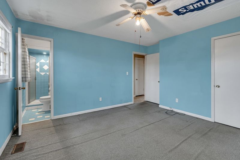 151 Robert Branch Drive Tullahoma, TN 37388 - Photo 15 of 18 a view of an empty room with a chandelier fan