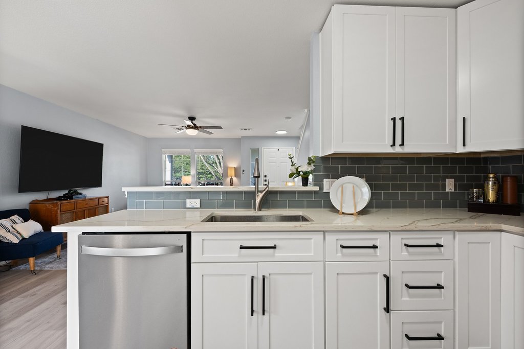 173 Decker Kyle, TX 78640 - Photo 3 of 37 Remodeled Open Concept Kitchen looking into the large spacious living room.