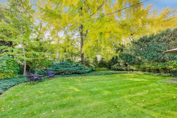 a view of outdoor space with deck and yard