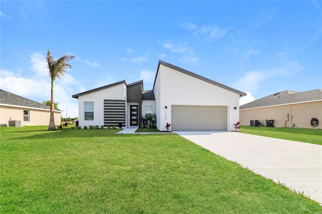 1055 Desmoines Lane Poinciana, FL 34759 - Photo 1 of 13