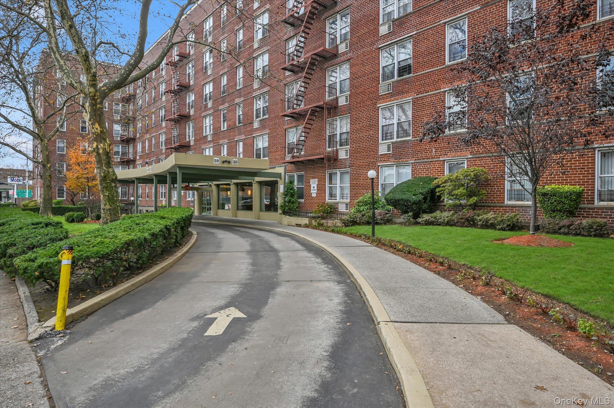 59-30 108th Street, Unit 4P Queens, NY 11368 - Photo 18 of 18 a view of building with yard