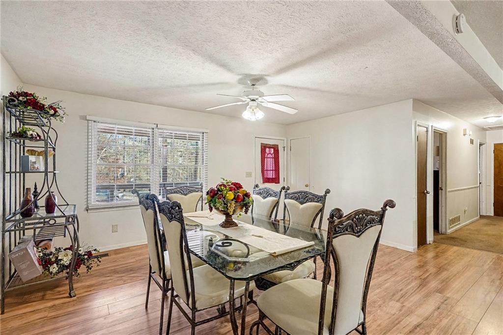 146 Mt Bethel Road McDonough, GA 30252 - Photo 11 of 32 a view of a dining room with furniture window and outside view