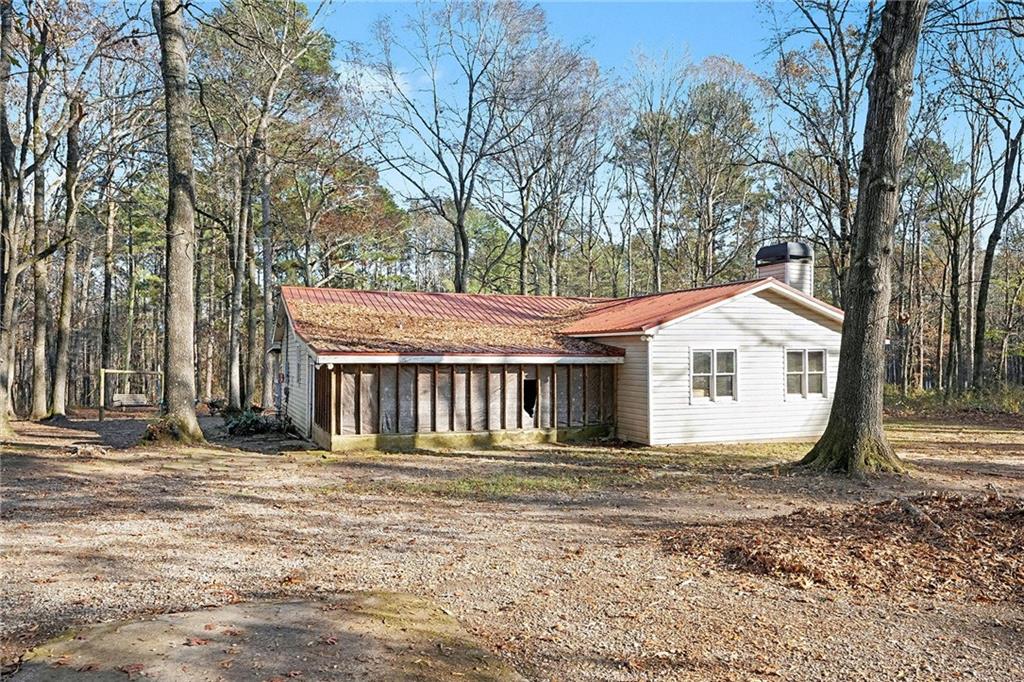146 Mt Bethel Road McDonough, GA 30252 - Photo 30 of 32 a house view with a outdoor space