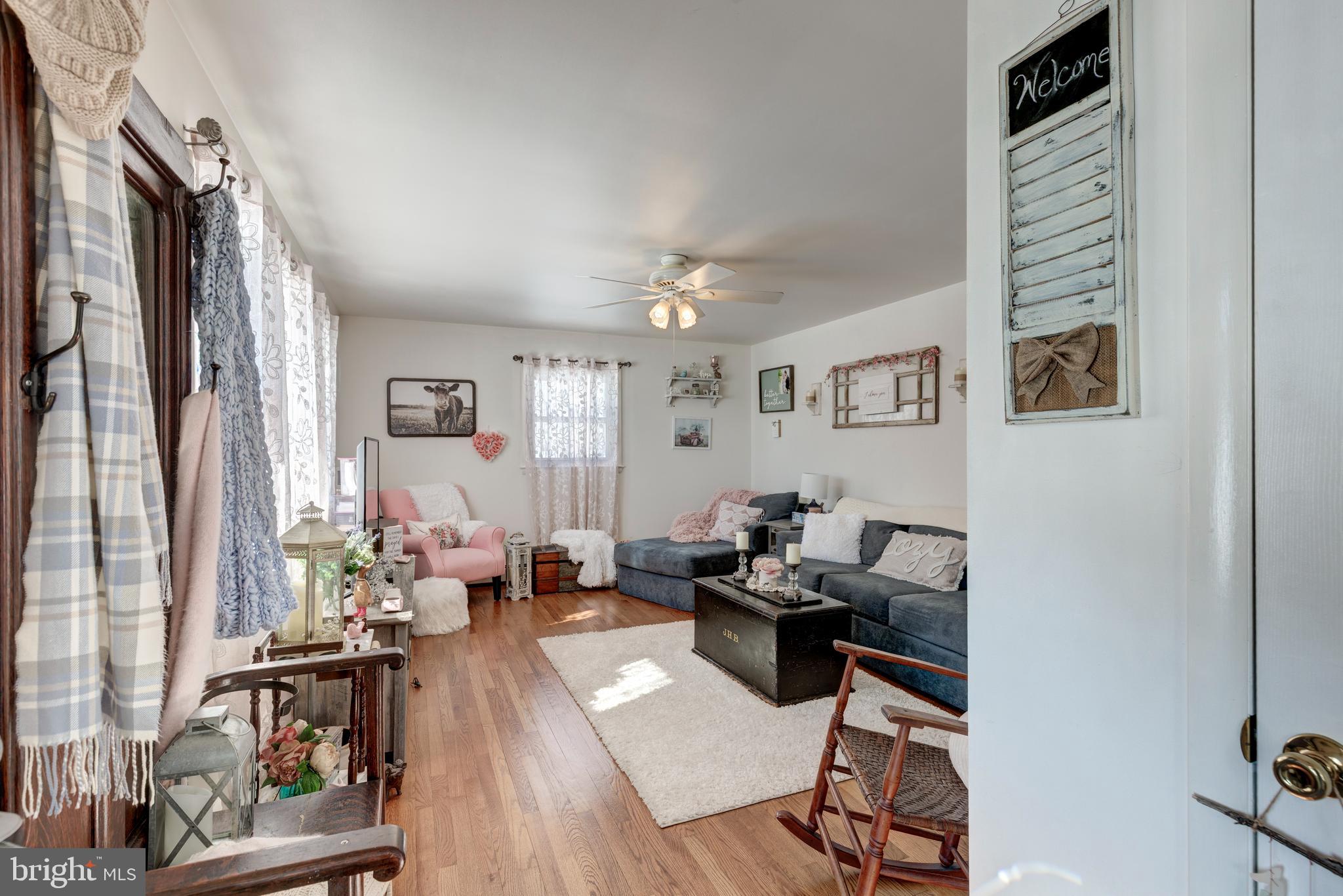3820 Kump Station Road Taneytown, MD 21787 - Photo 12 of 59 a living room with furniture window and wooden floor