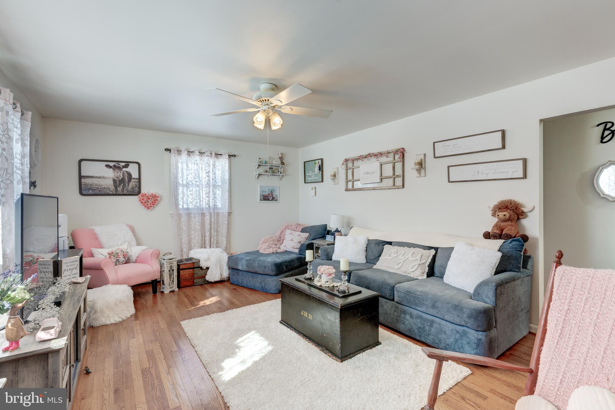 3820 Kump Station Road Taneytown, MD 21787 - Photo 13 of 59 a living room with furniture and wooden floor