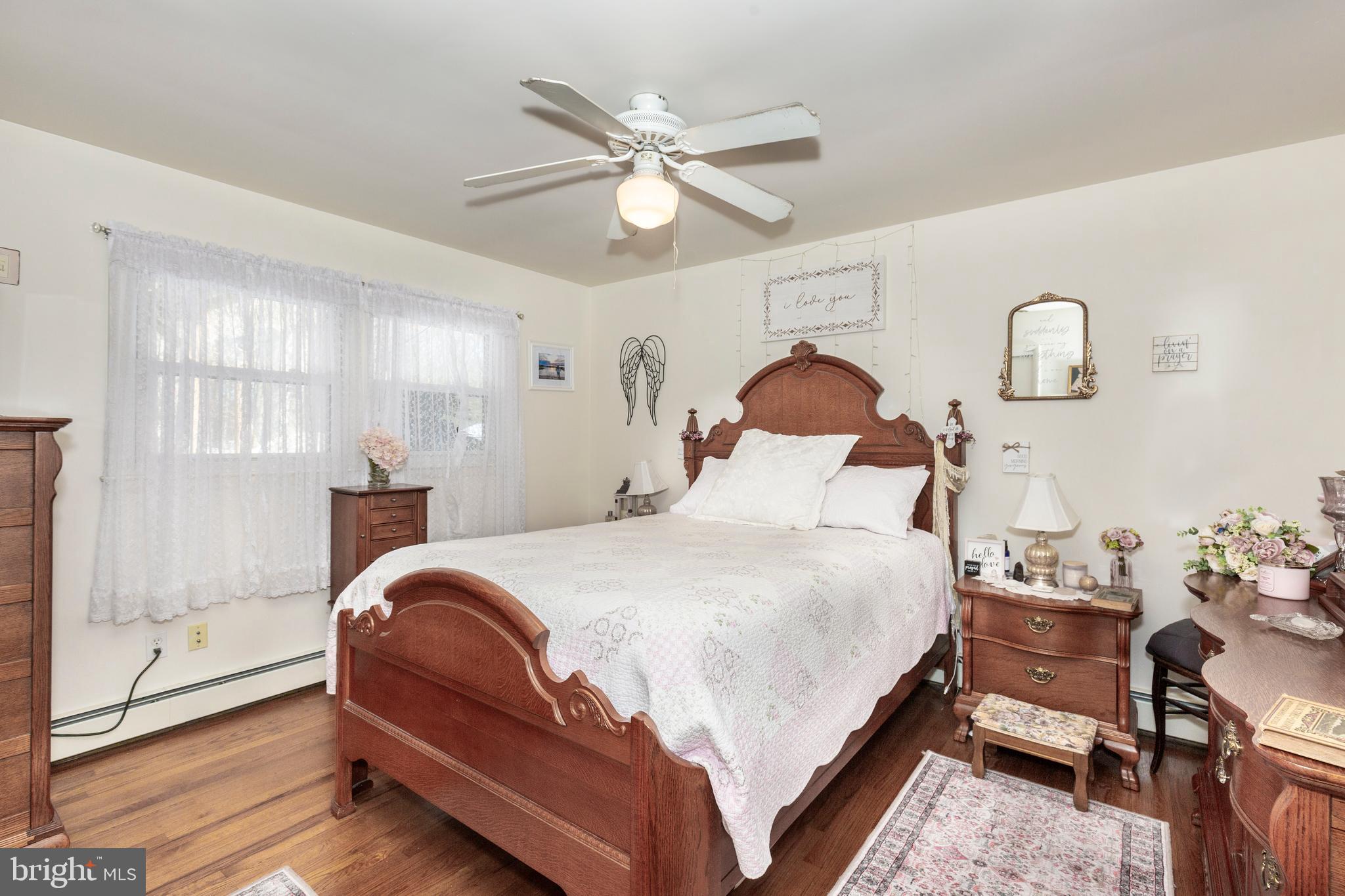 3820 Kump Station Road Taneytown, MD 21787 - Photo 16 of 59 a bedroom with a bed and window