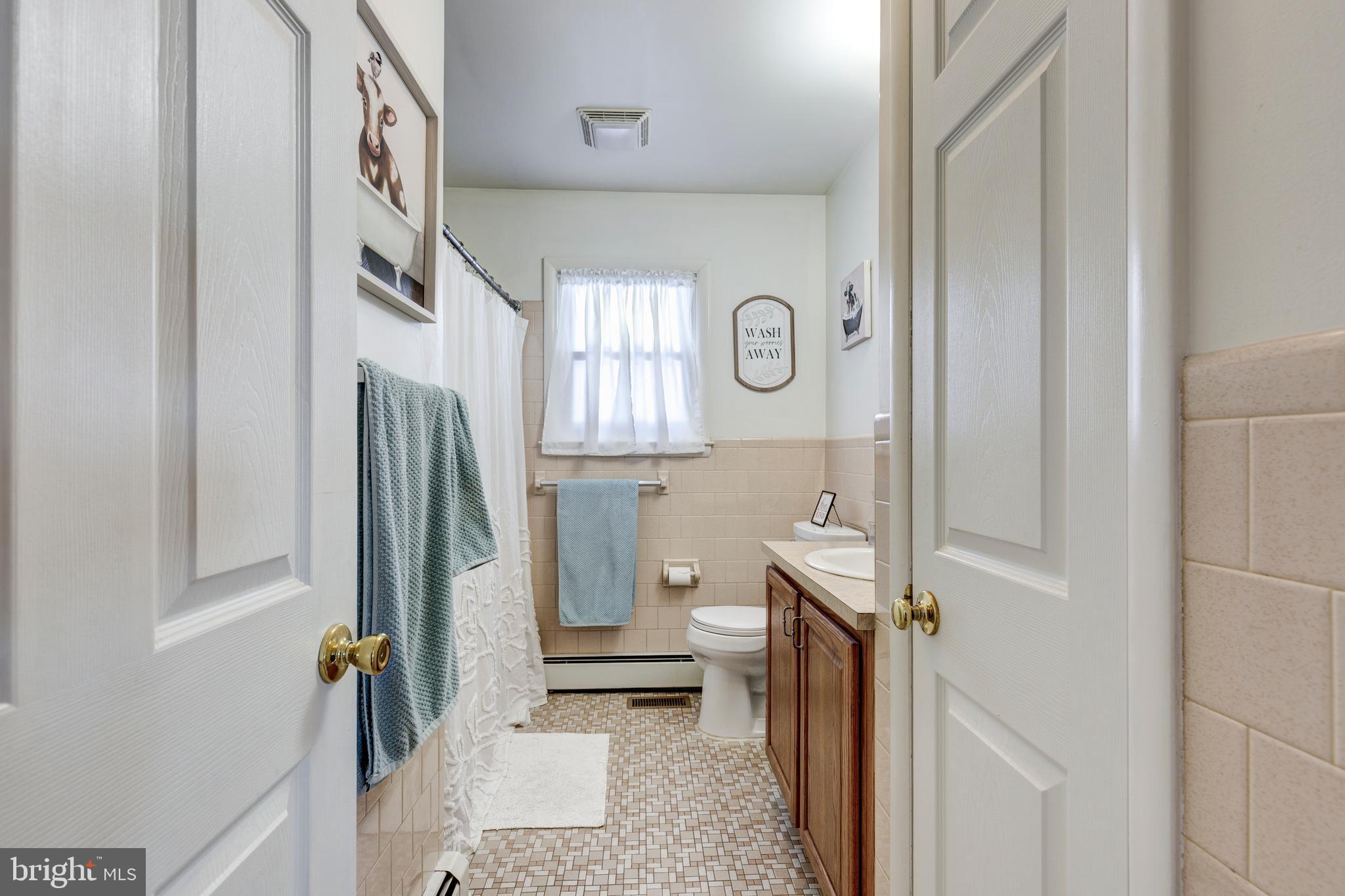 3820 Kump Station Road Taneytown, MD 21787 - Photo 18 of 59 a bathroom with a toilet and a shower