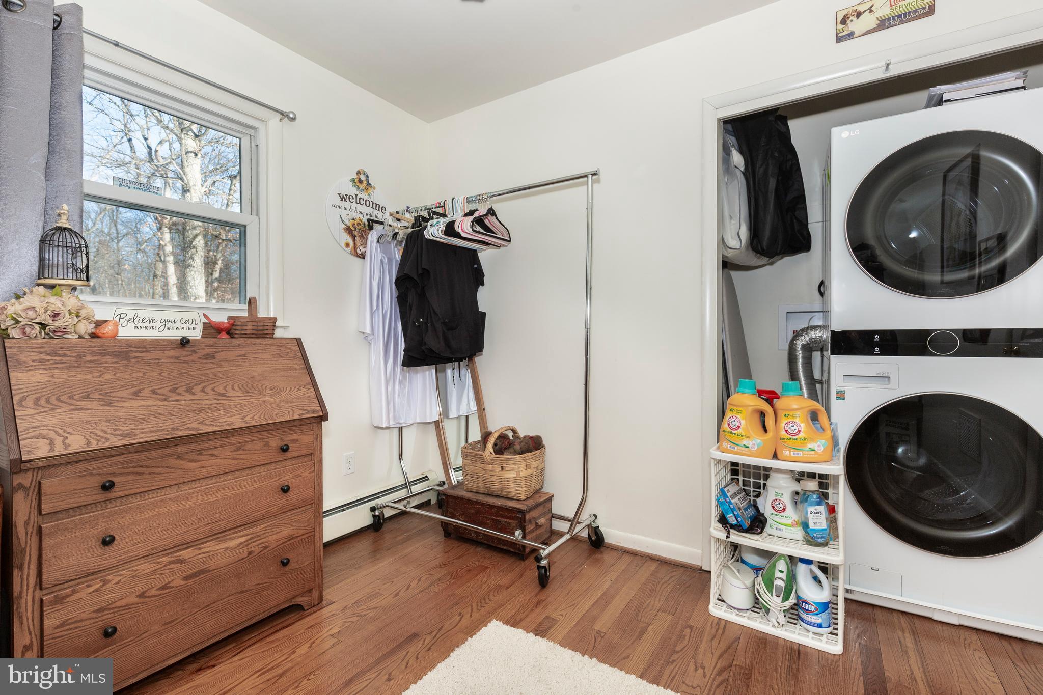 3820 Kump Station Road Taneytown, MD 21787 - Photo 21 of 59 a view of a bedroom with washer and dryer