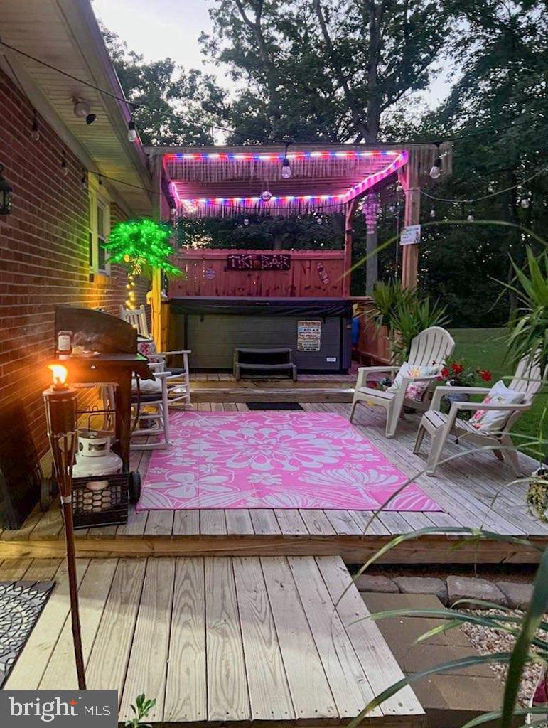 3820 Kump Station Road Taneytown, MD 21787 - Photo 32 of 59 a patio with table and chairs