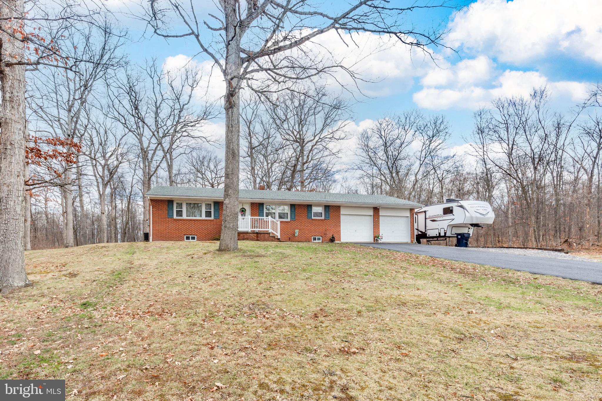 3820 Kump Station Road Taneytown, MD 21787 - Photo 47 of 59 a house with trees in front of it