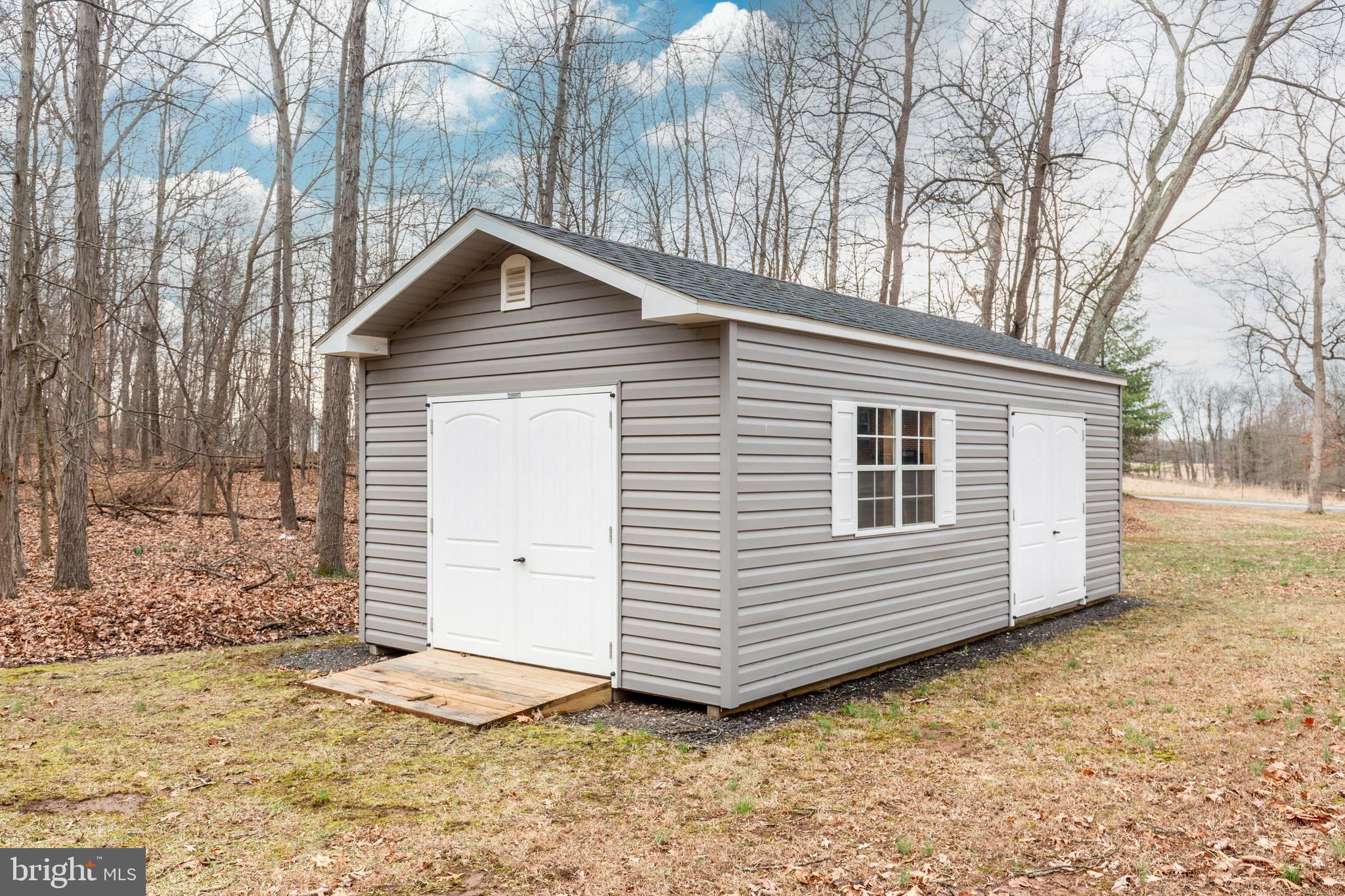 3820 Kump Station Road Taneytown, MD 21787 - Photo 54 of 59 a view of a house with a yard