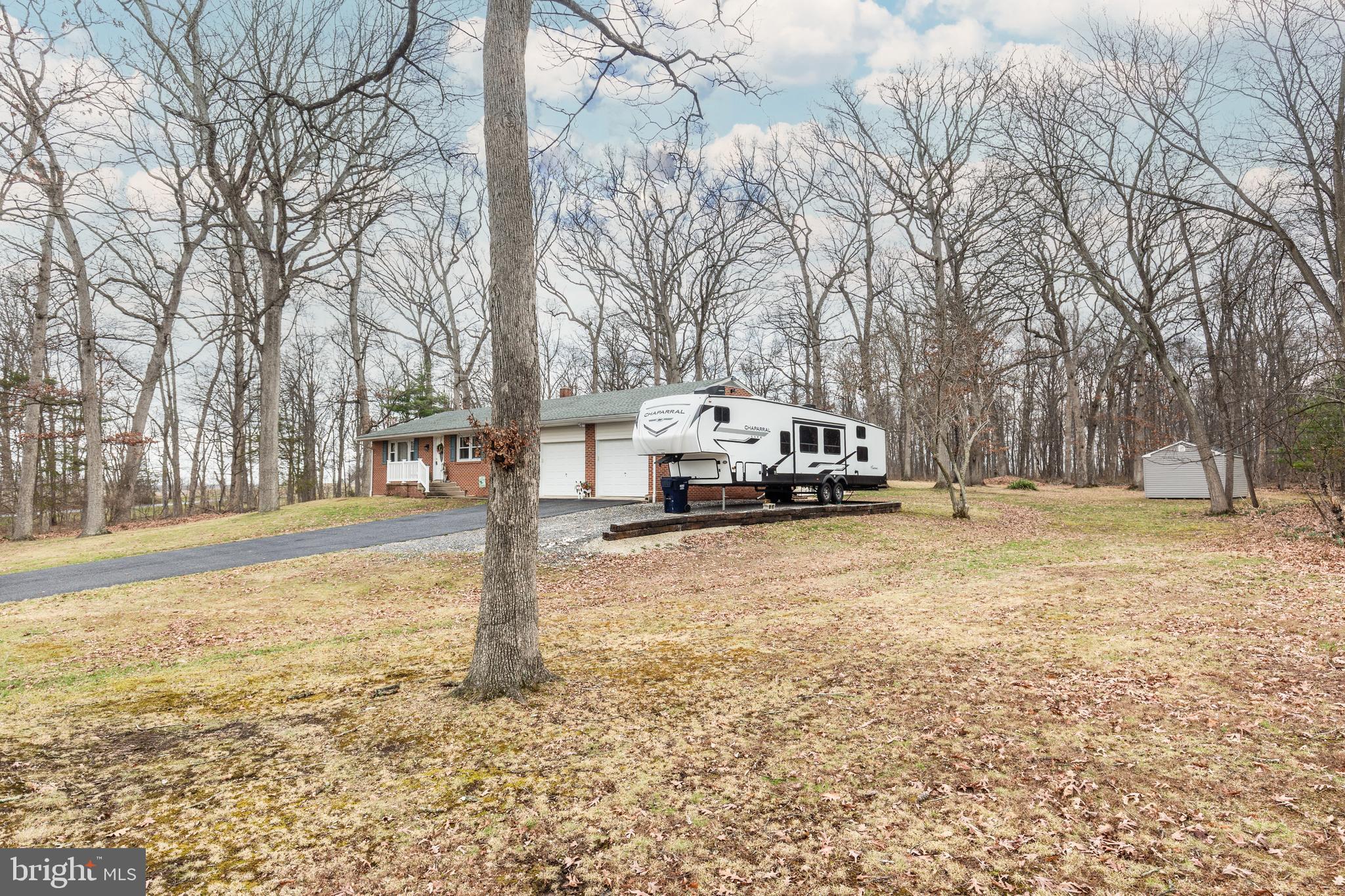 3820 Kump Station Road Taneytown, MD 21787 - Photo 59 of 59 a car parked in front of white house