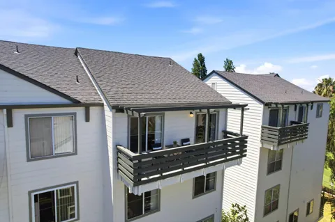 a aerial view of a house with a balcony