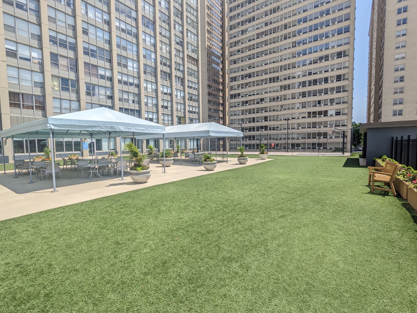 655 West Irving Park Road, Unit 617 Chicago, IL 60613 - Photo 30 of 33 a swimming pool view with a outdoor seating