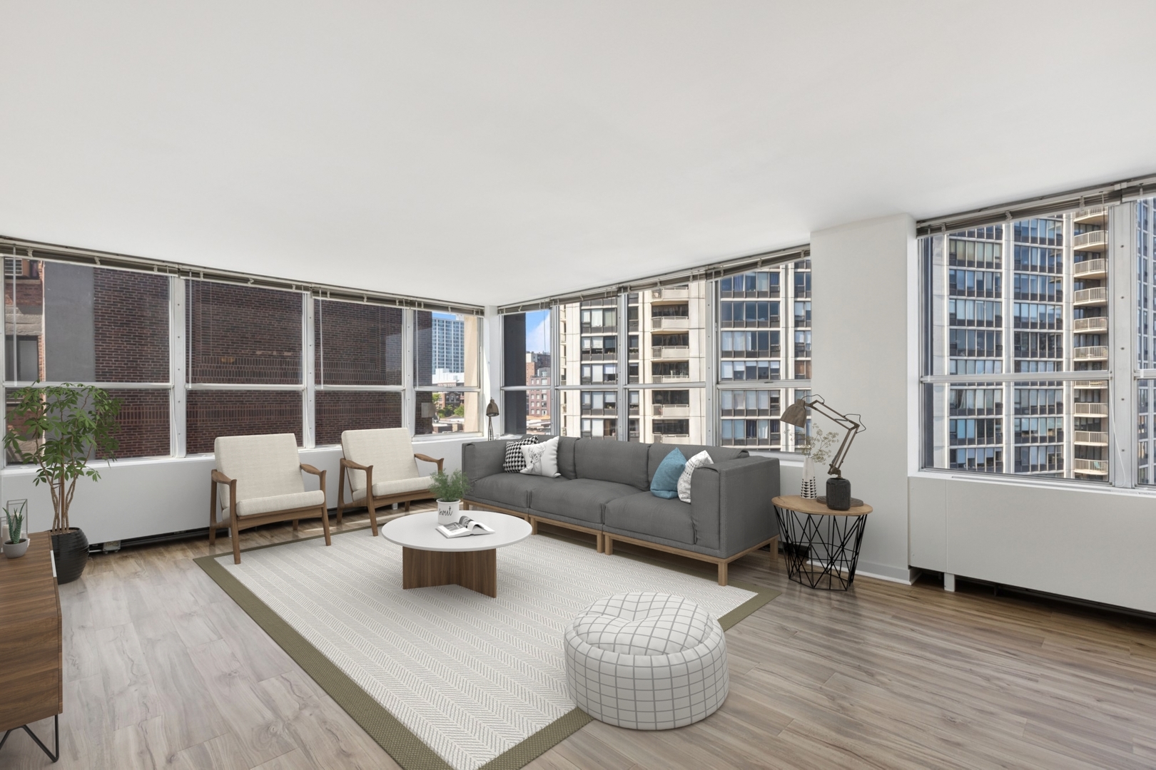 655 West Irving Park Road, Unit 617 Chicago, IL 60613 - Photo 7 of 33 a living room with furniture and a large window