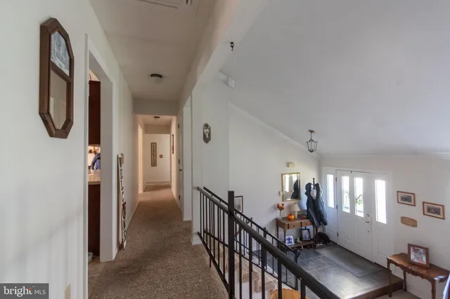 a view of an entryway with a workspace