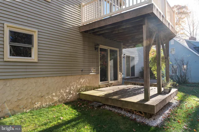 a view of house with yard