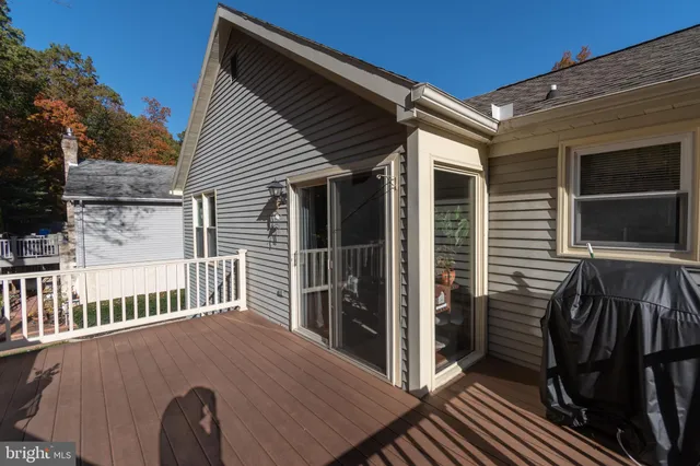 a terrace of a house with wooden floor
