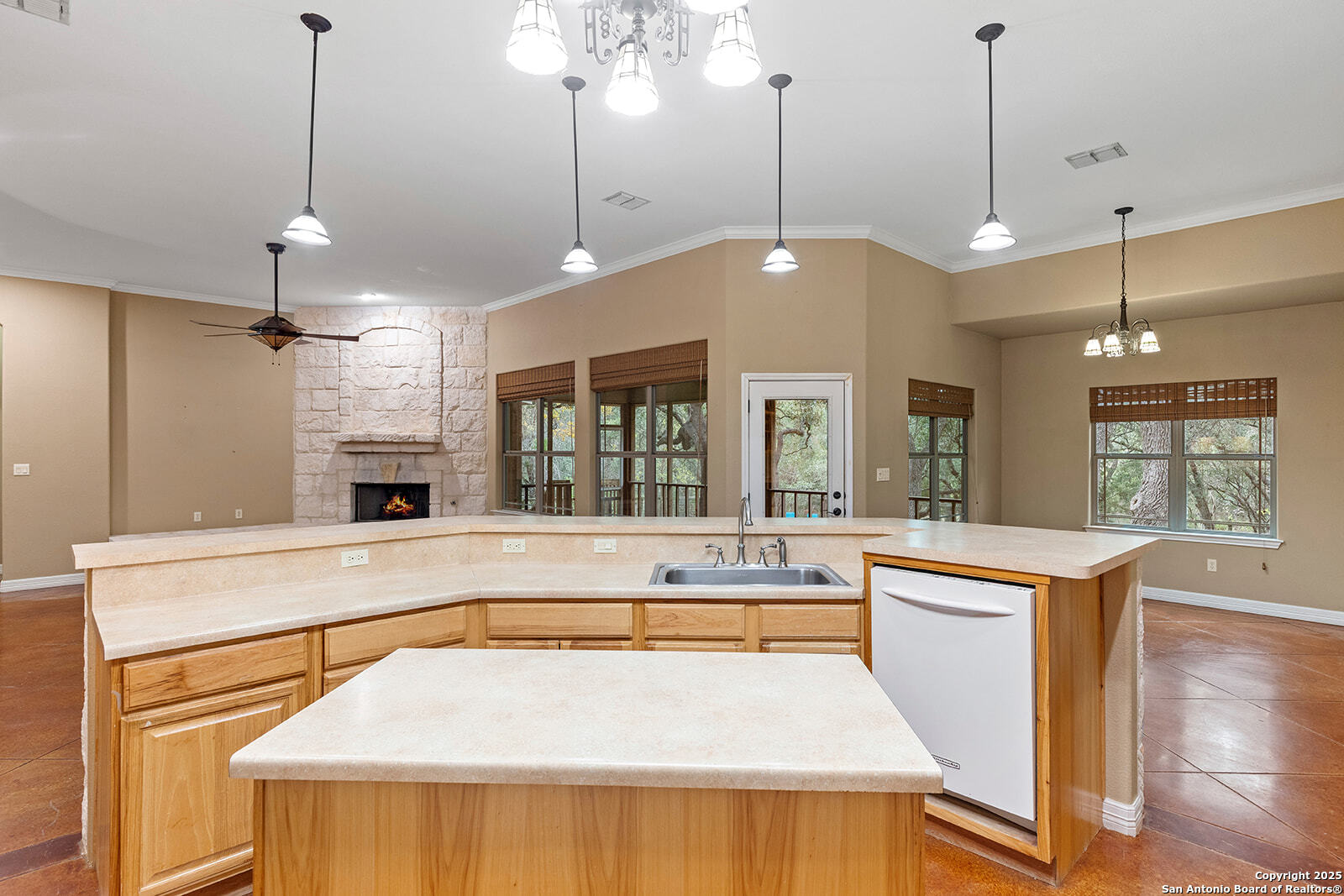 632 Copper Rim Spring Branch, TX 78070 - Photo 16 of 45 a large kitchen with granite countertop a stove and a wooden floor