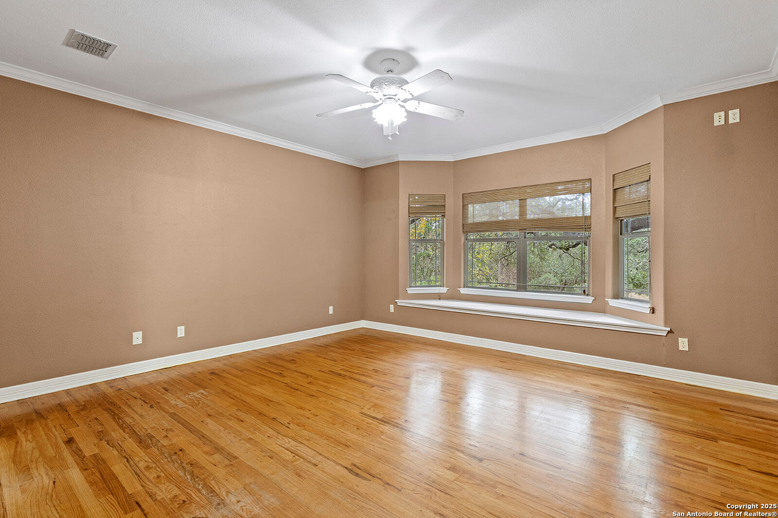 632 Copper Rim Spring Branch, TX 78070 - Photo 20 of 45 a view of an empty room with wooden floor and a window