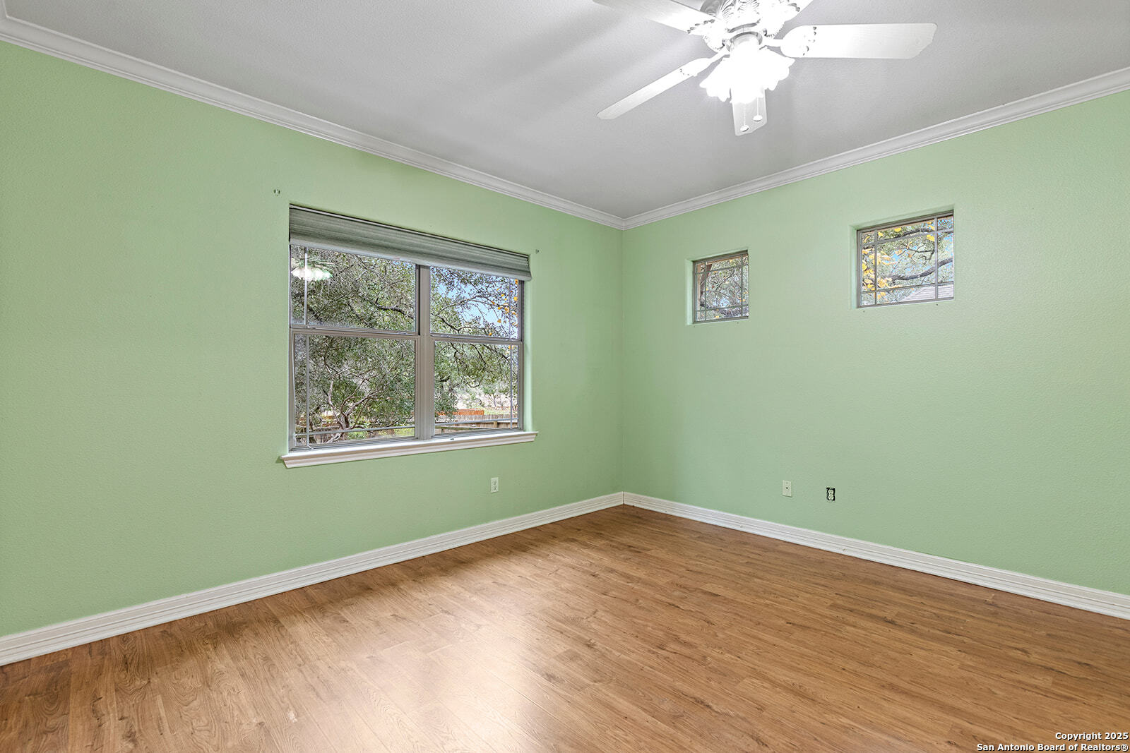 632 Copper Rim Spring Branch, TX 78070 - Photo 29 of 45 a view of empty room with wooden floor and fan